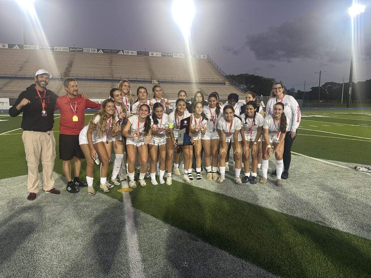 MAST Academy’s girls’ soccer team celebrates after beating Palmetto 7-3 in the GMAC championship match on Friday, Jan. 9, 2026 at Traz Powell Stadium.