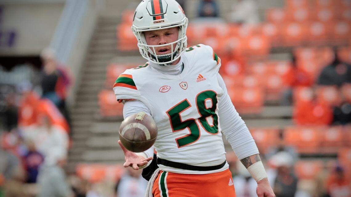 Miami Hurricanes long snapper Clay James (58) warms up before the game against the Clemson Tigers at Frank Howard Field at Clemson Memorial Stadium in Clemson, South Carolina on Saturday, November 19, 2022.