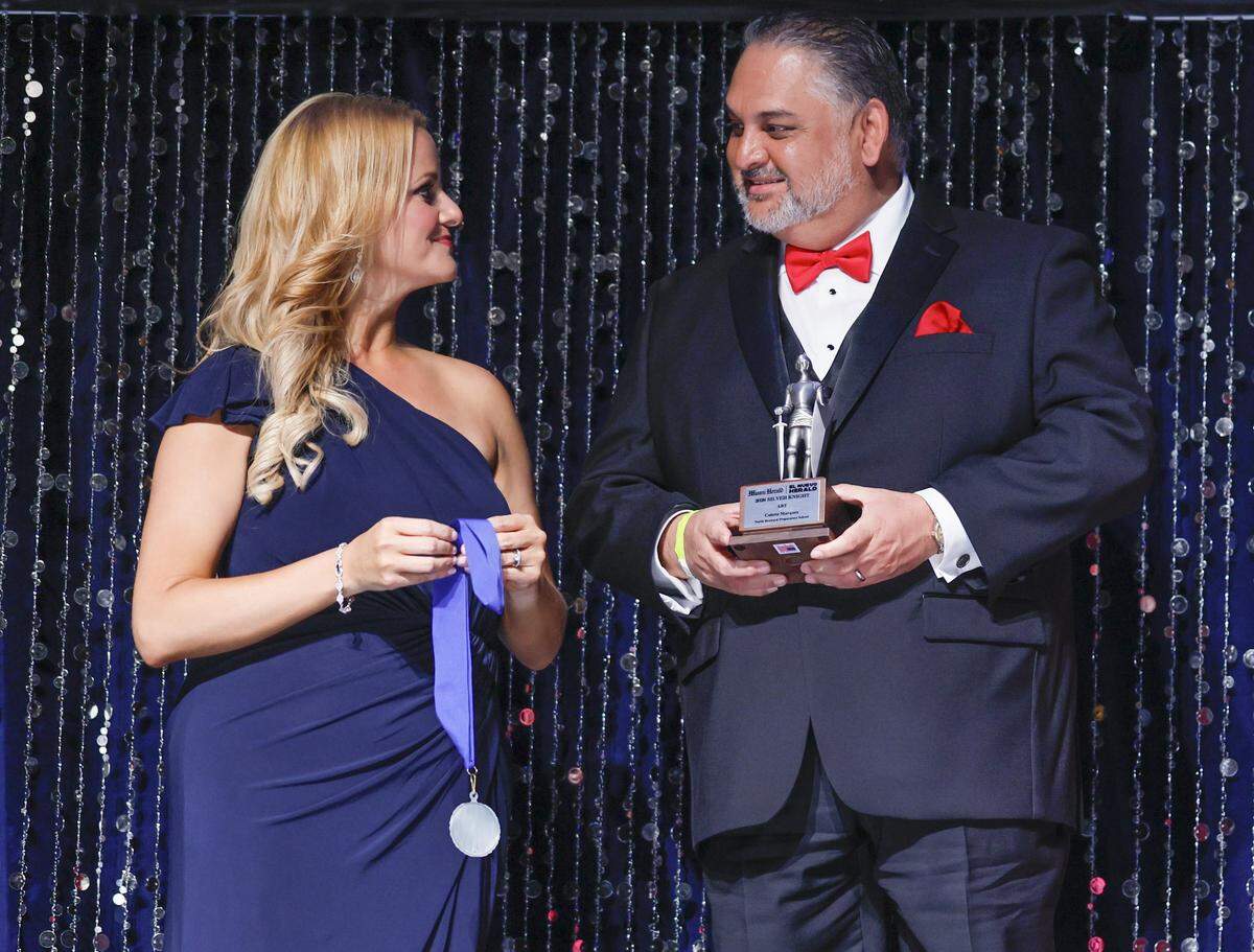 Angela Dwyer, Senior Account Executive at the Miami Herald & el Nuevo Herald ,and Alex Mena, Executive Editor, prepare to meet the award winners during the 68th Silver Knight Award Ceremony at the James L.&nbsp;Knight&nbsp;Center on Tuesday, May 12, 2026, in downtown Miami, Fla. 