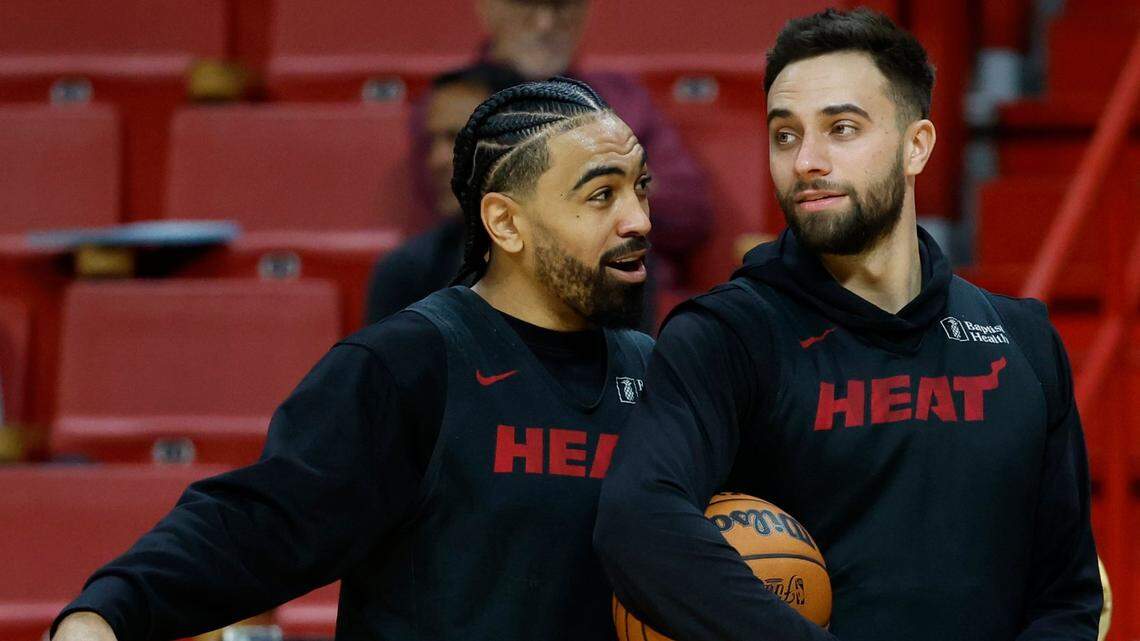 Miami Heat’s Gabe Vincent (2) and guard Max Strus (31) interact during practice at the NBA Finals media day at Kaseya Center on June 6, 2023.