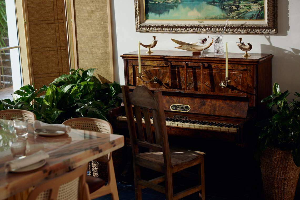 The piano in the dining room offers a little New Orleans flair at Joliet in Miami Beach.