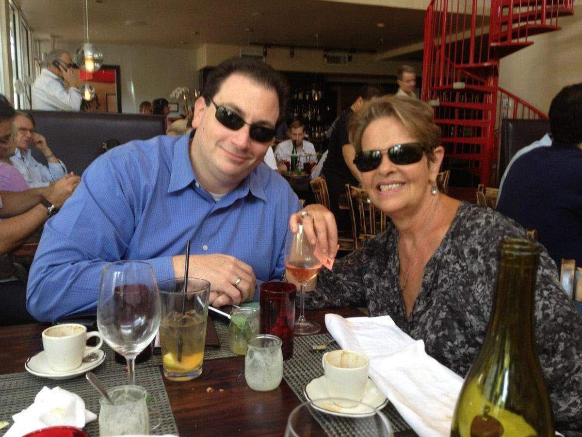 Larry Carrino and Susan Brustman dining out in 2012. Brustman hired Carrino at her Miami PR firm when he was 20 and he grew to become a partner and assumed ownership of the firm upon Brustman’s retirement. “I was lucky enough, blessed enough to find a home here under her auspices and make it my own,” Carrino said. “Never saw a need to change the name even when she was fully divested as it was/is an honor to have my name beside hers and to say her name carried clout in the industries we serve is a gross understatement.”