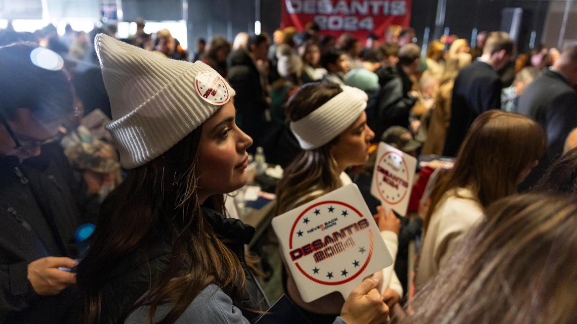 Supporters of Florida Gov. Ron DeSantis wait to hear him speak during a rally at the Never Back Down super PAC headquarters on Saturday, Jan. 13, 2024, in West Des Moines, Iowa. DeSantis, who is campaigning across Iowa, is running for the Republican presidential nomination.