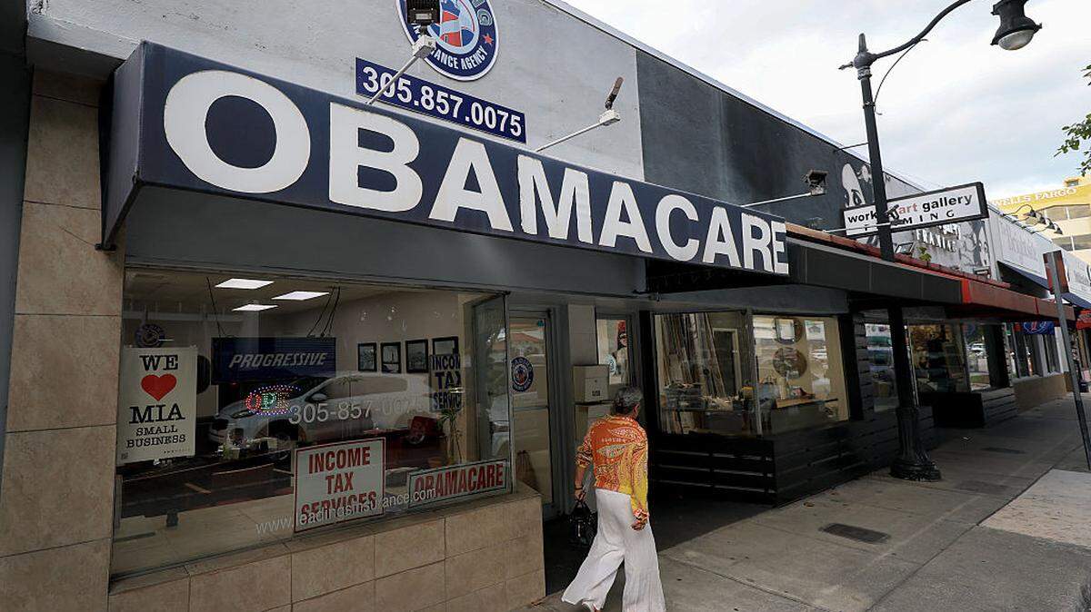 An Obamacare sign is displayed outside an insurance agency on Nov. 12, 2025, in Miami.
