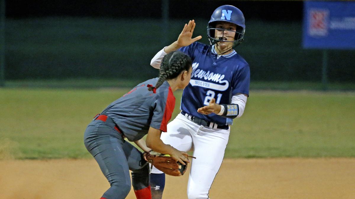 The Gables Kylie Santana (4) is late on the tag as Newsome’s Bailee Leistl (21) is called safe at second base as Coral Gables High plays Newsome girls softball in Class 9A state semifinals at Jackie Robinson Training Complex in Vero Beach on Thursday, May 23, 2019.