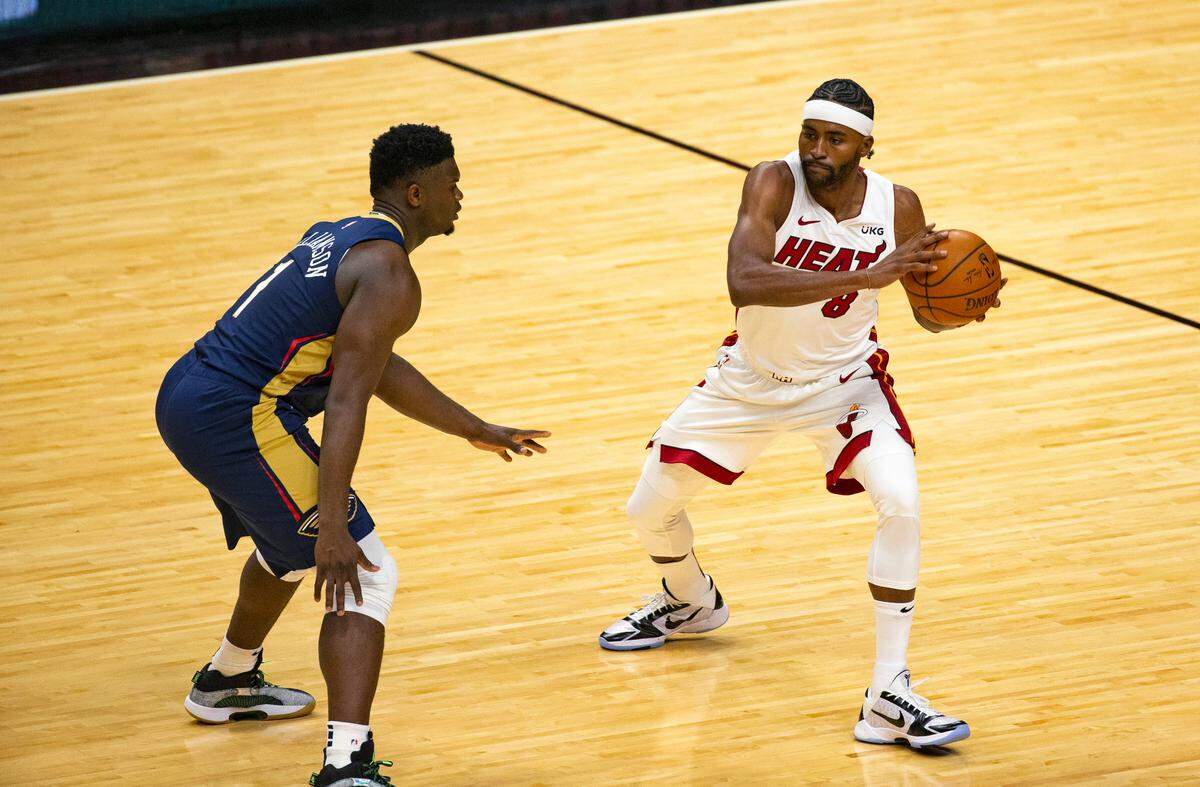 Miami Heat forward Maurice Harkless (8) drives against New Orleans Pelicans forward Zion Williamson (1) in the first quarter of an NBA basketball preseason game at AmericanAirlines Arena on Monday, Dec. 14, 2020.