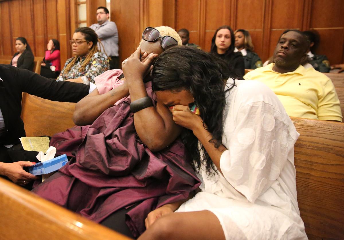 Family members of murder victim Terrilyn Gray break down in tears as a 911 call of her murder is played in the courtroom. Gray was stabbed to death in her Miami Gardens home on August 2012 by her ex-boyfriend Alphonso Jerard Lucas. Lucasâ€™s trial began Tuesday, June 18, 2109 in Judge Teresa Mary Poolerâ€™s courtroom . Lucas is facing first degree murder, attempted murder and animal cruelty charges after killing Gray, stabbing her daughter, Curtina Gray, several times and also stabbing their dog to death as well during the attack.