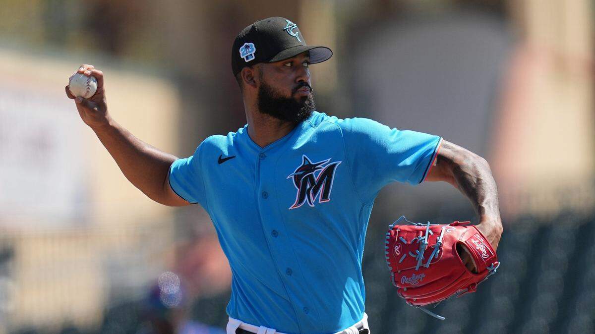 Mar 1, 2023; Jupiter, Florida, USA; Miami Marlins starting pitcher Sandy Alcantara (22) pitches against the New York Mets in the second inning at Roger Dean Stadium. Mandatory Credit: Jim Rassol-USA TODAY Sports