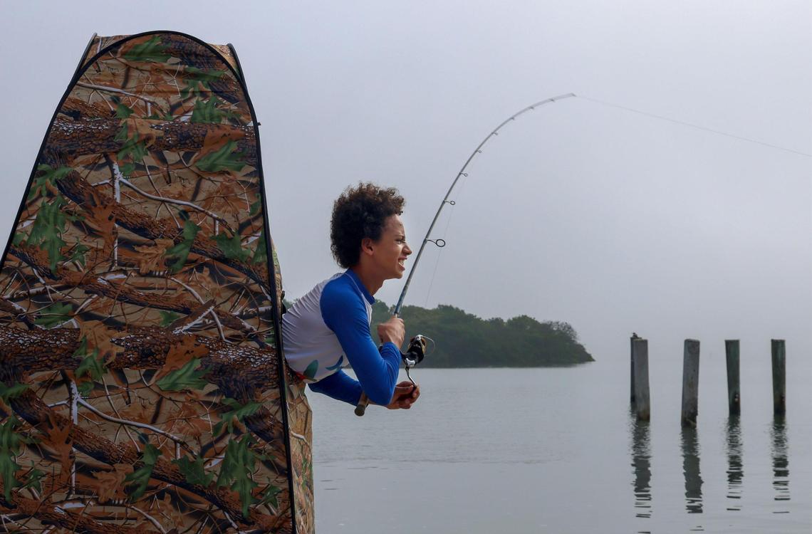 Miles Juste enjoys the Pop-Up Personal Privacy Tent, one of the items featured in the Dave Barry 2022 Holiday Gift Guide.