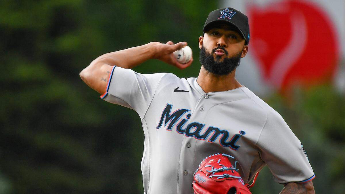 May 24, 2023; Denver, Colorado, USA; Miami Marlins starting pitcher Sandy Alcantara (22) delivers a pitch in the first inning against the Colorado Rockies at Coors Field. Mandatory Credit: John Leyba-USA TODAY Sports