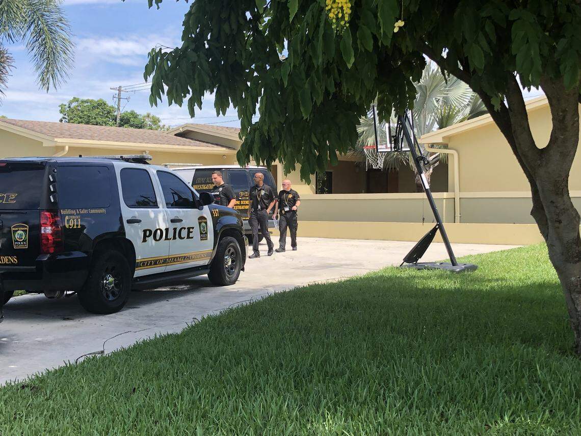 Miami Gardens police officers at the home of assistant principal Ernest Joseph Roberts on June 14, 2019. He is accused of murdering a fellow educator, Kameela Russell.
