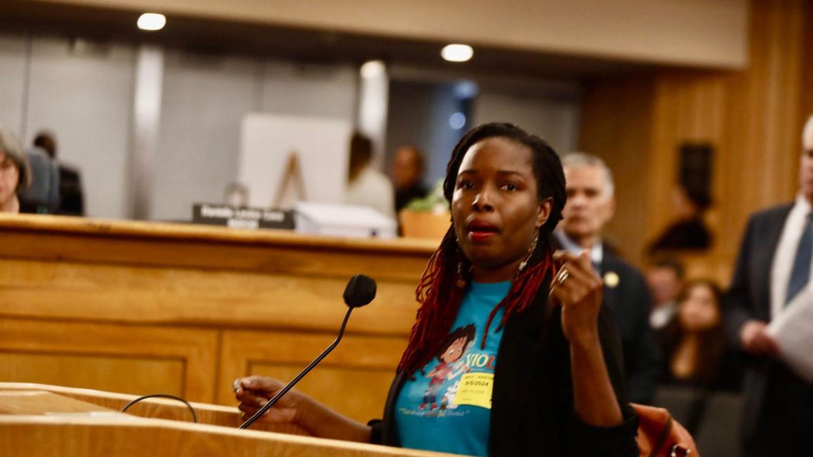 Portia Dunkley, CEO and founder of Teeny Violini, a music program for youth, speaks during the Miami-Dade County budget hearing to advocate against cuts to the Cultural Affairs Department’s grant program.