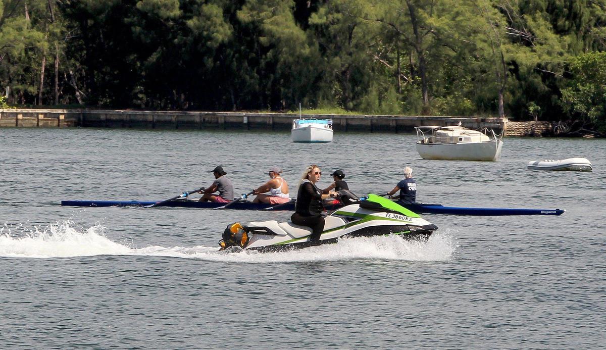A Miami Rowing Club crew shares the Miami Marine Stadium basin with water bikes, and it’s not a happy mix. An increase in motorized boat traffic during the coronavirus pandemic has caused turbulent waters and tempers at the Virginia Key lagoon.