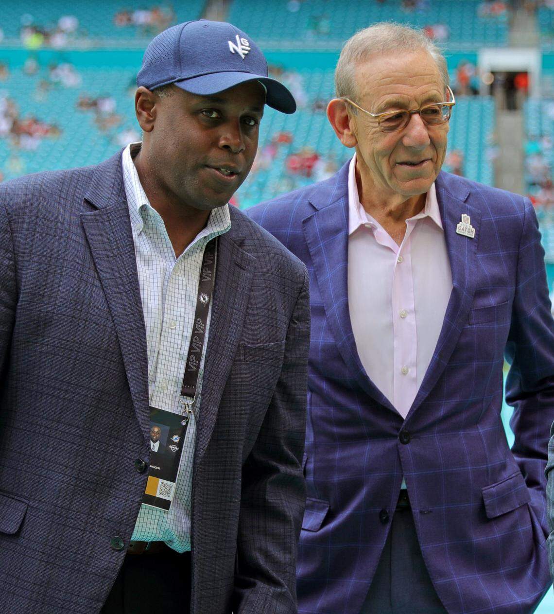Miami Dolphins Miami general manager Chris Grier, left, and Dolphins owner Stephen M. Ross before the start of an NFL football game against the Atlanta Falcons at Hard Rock Stadium on Sunday, Oct. 24, 2021, in Miami Gardens. 