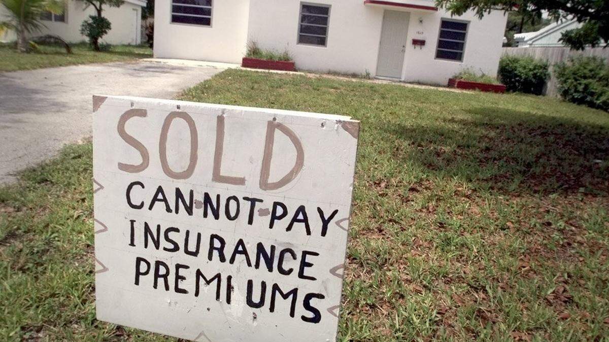 This photo was taken in front of a Miami Gardens home 22 years ago. Property insurance costs a lot more now, and it’s causing big problems as more insurers leave Florida.