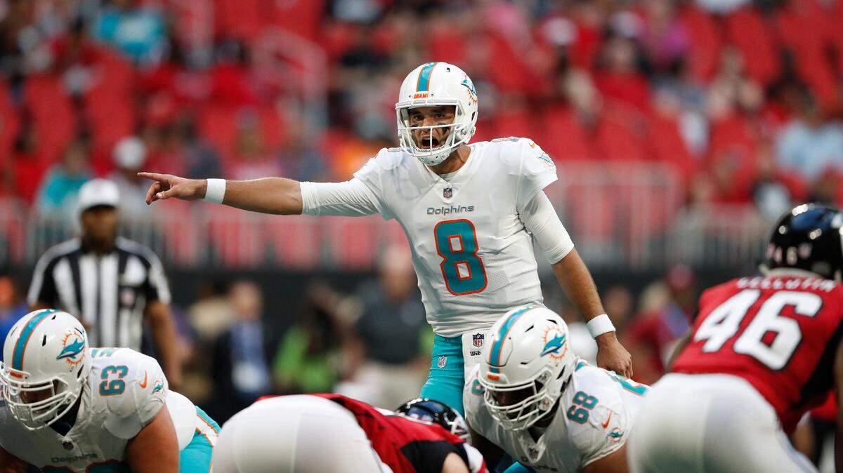 Miami Dolphins quarterback Brock Osweiler (8) calls an audible against the Atlanta Falcons during the first half of an NFL preseason football game, Thursday, Aug. 30, 2018, in Atlanta.