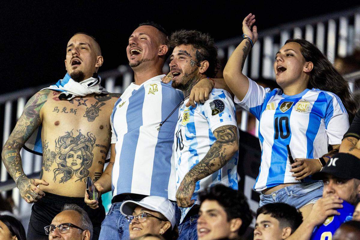 Argentina fans react after their team defeated Puerto Rico 6-0 during an international team friendly at Chase Stadium on Tuesday, October 14, 2025, in Fort Lauderdale, Fla.