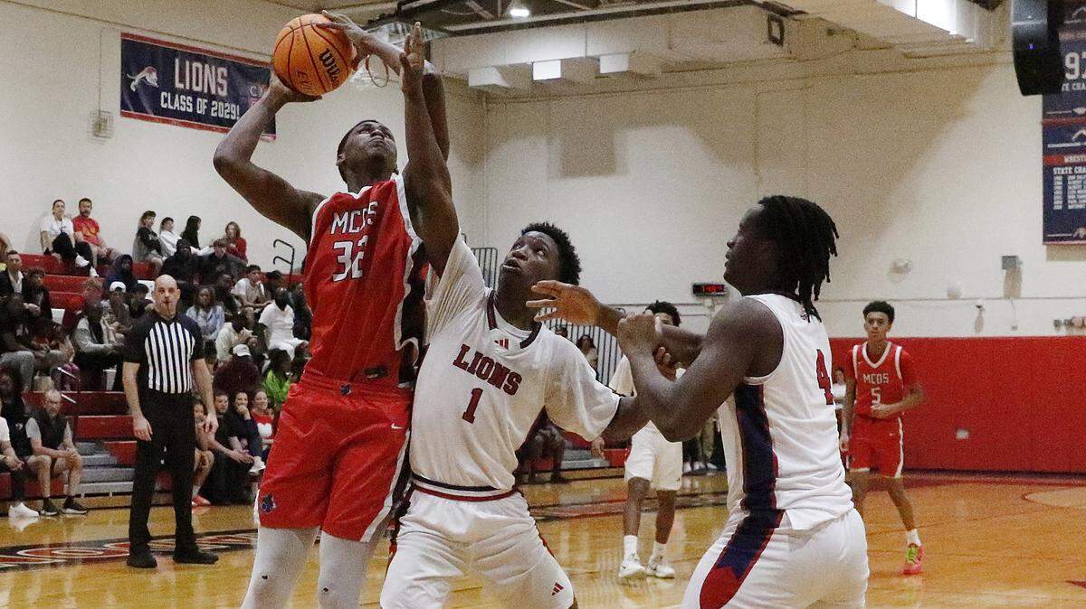 Miami Country Day Spartans Kaleb Corbitt (32) attempts a shot against Chaminade-Madonna Lions during the Region 4-2A quarterfinal boys basketball game on Saturday, February 14, 2026 at Chaminade-Madonna School in Hollywood.  Andrew Uloza / for Miami Herald