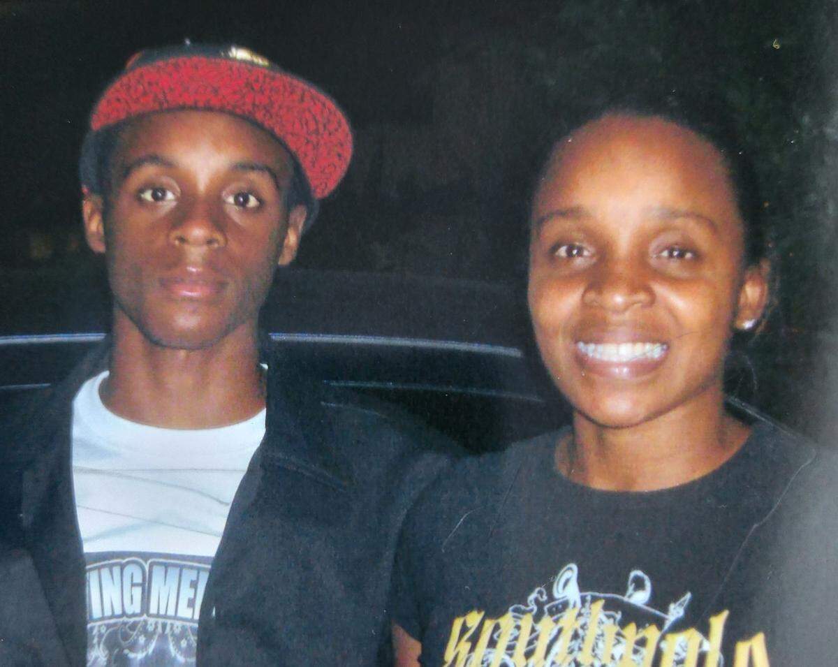 Derrick “Termite” Gloster and his mother, Tangela Johnson. Gloster was 18 when he was shot and killed in what was known as the Liberty City Massacre on Jan. 23, 2009.