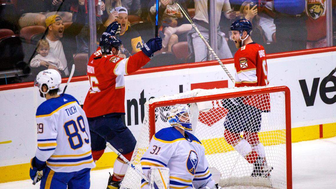 Florida Panthers center Sam Bennett (9) celebrates with teammate Aleksander Barkov (16) after scoring the winning goal during the third period of an NHL game against the Buffalo Sabres at the FLA Live Arena on Friday, April 8, 2022 in Sunrise, Fl.