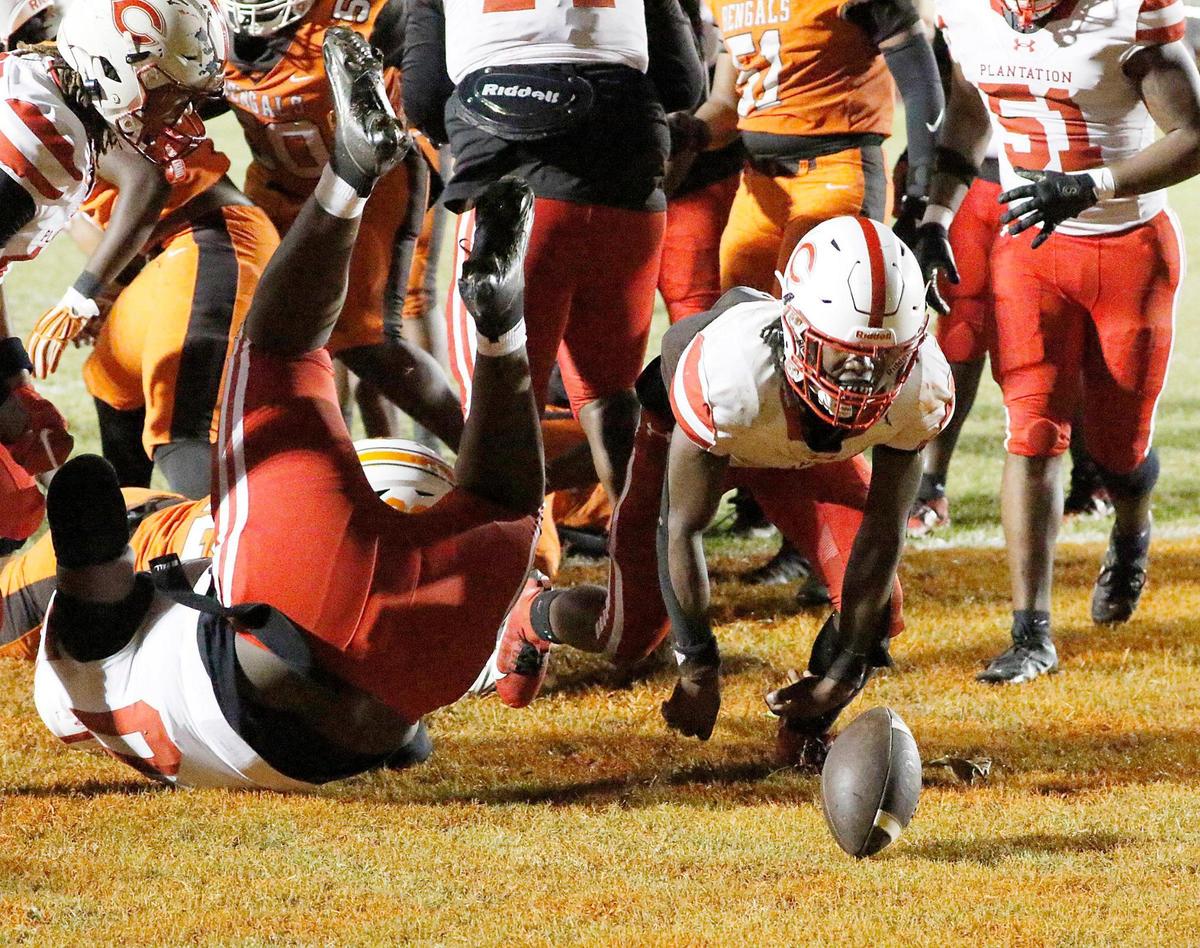 Plantation Colonels Zachariah Ray scores a touchdown against Piper Bengals during football game on Friday, October 18, 2024 at Piper HS in Sunrise. Andrew Uloza / for Miami Herald