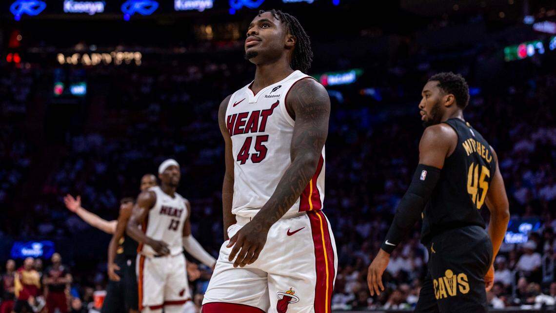 Miami Heat guard Davion Mitchell (45) reacts to a play during the first half of Game 4 of the Eastern Conference NBA Playoffs against the Cleveland Cavaliers at Kaseya Center on April 28, 2025, in Miami.