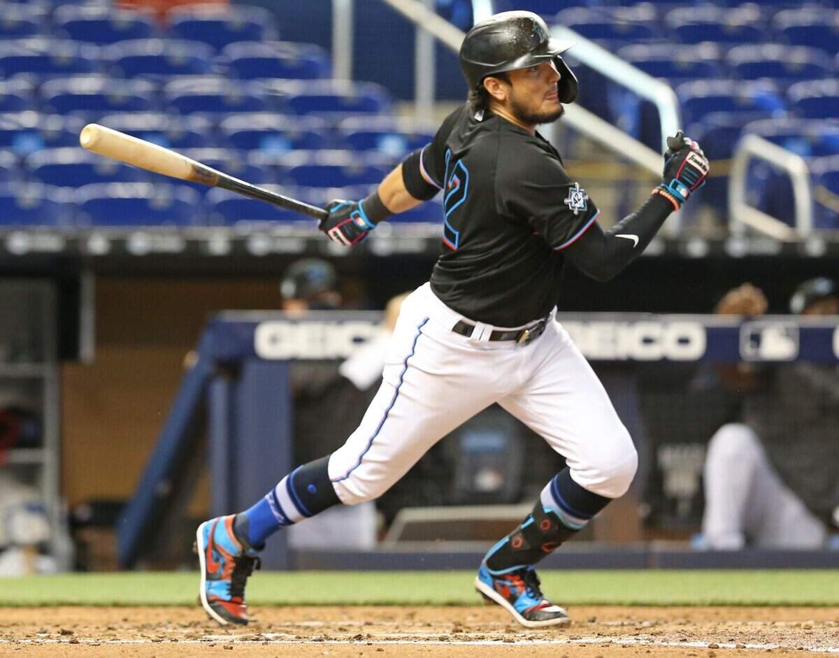 Miami Marlins shortstop Miguel Rojas (19) at bat as the Miami Marlins host the Tampa Bay Rays at Marlins Park in Miami on Saturday, August 29, 2020.