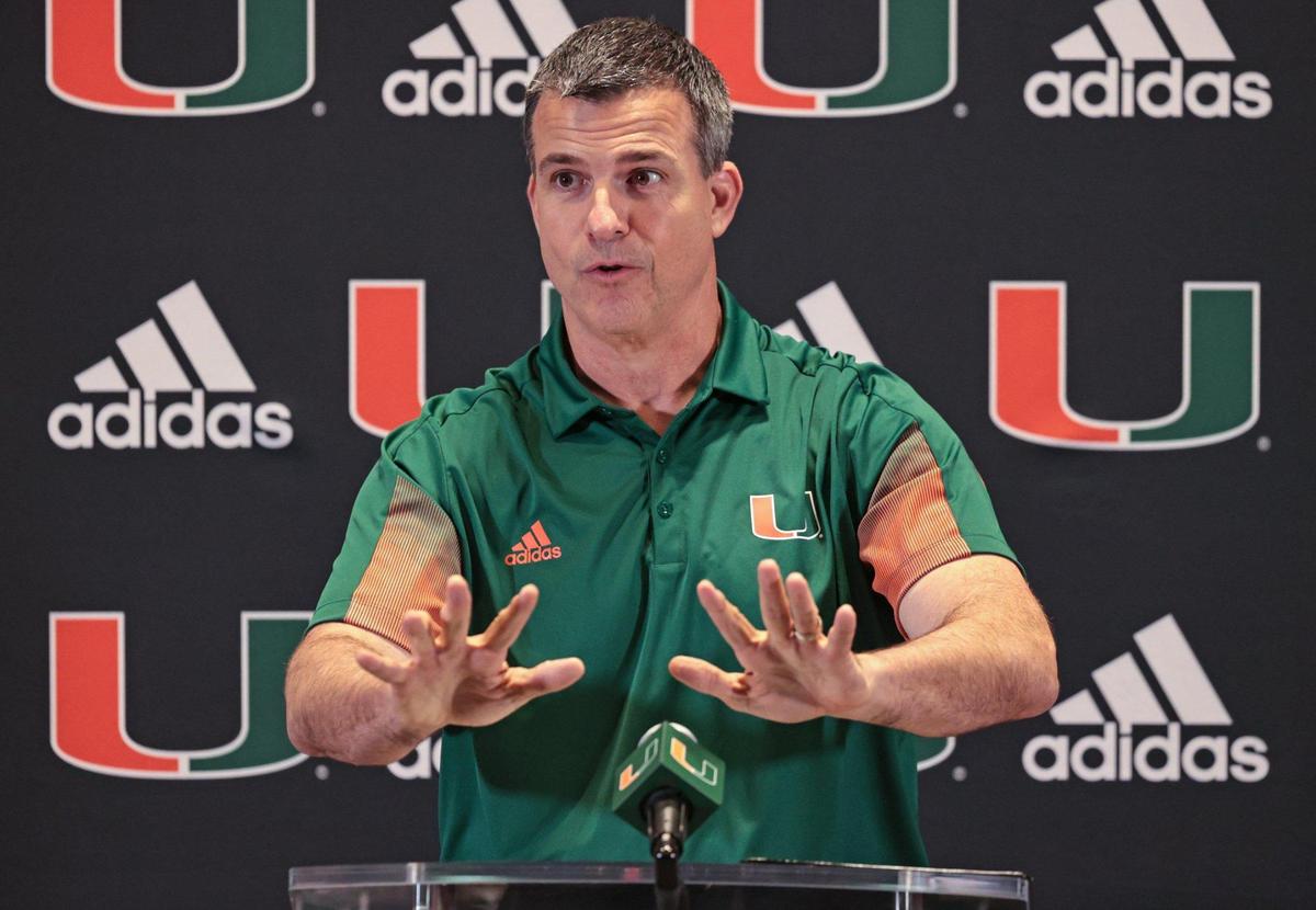 Miami Hurricanes coach Mario Cristobal wrapped up the first day of the three-day early signing period as he speaks to reporters during a press conference at the Bob Mann Auditorium Schwartz Center for Athletic Excellence in Coral Gables on Wednesday, December 15, 2021.