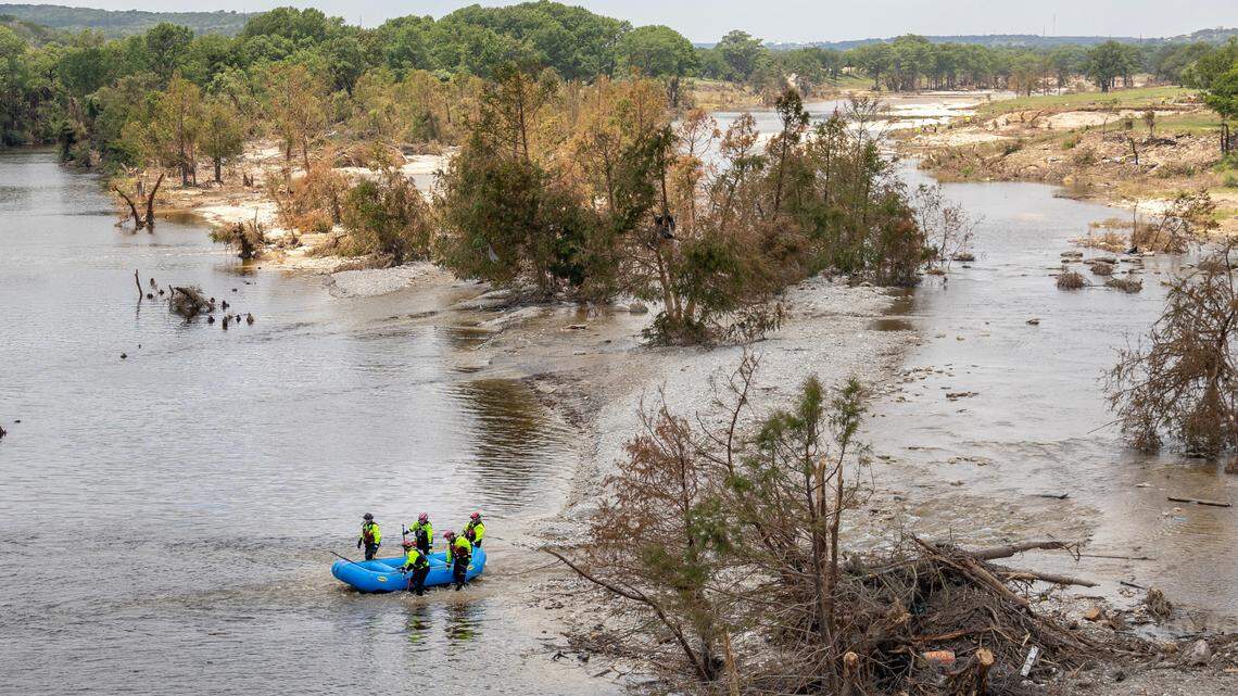 A team searches for victims on the Guadalupe River in Kerrville, Texas, on July 12, 2025.