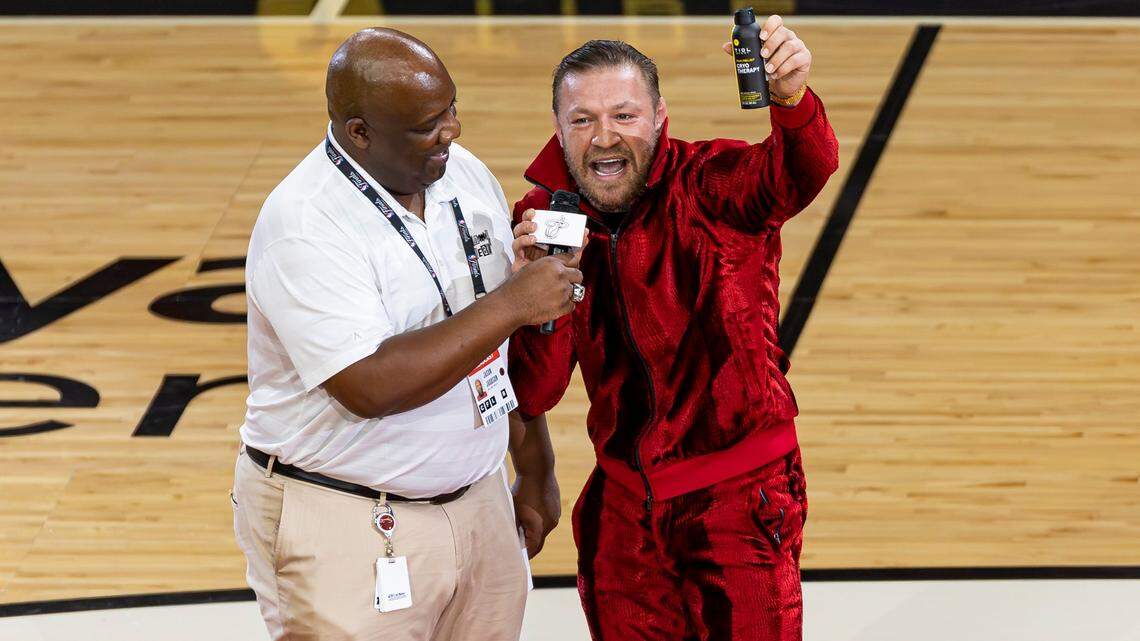 Mixed Martial Arts fighter Conor McGregor on the court during a timeout period in Game 4 of the NBA Finals between the Miami Heat and the Denver Nuggets. It was the same night a woman claimed McGregor sexually assaultd her at the game. Wednesday, state prosecutors said he would not be charged.