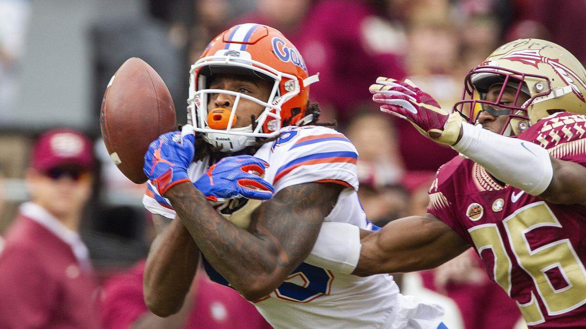 Florida State defensive back Asante Samuel Jr. (26) breaks up a pass intended for Florida wide receiver Tyrie Cleveland in the first half of an NCAA college football game in Tallahassee, Fla., Saturday, Nov. 24, 2018.