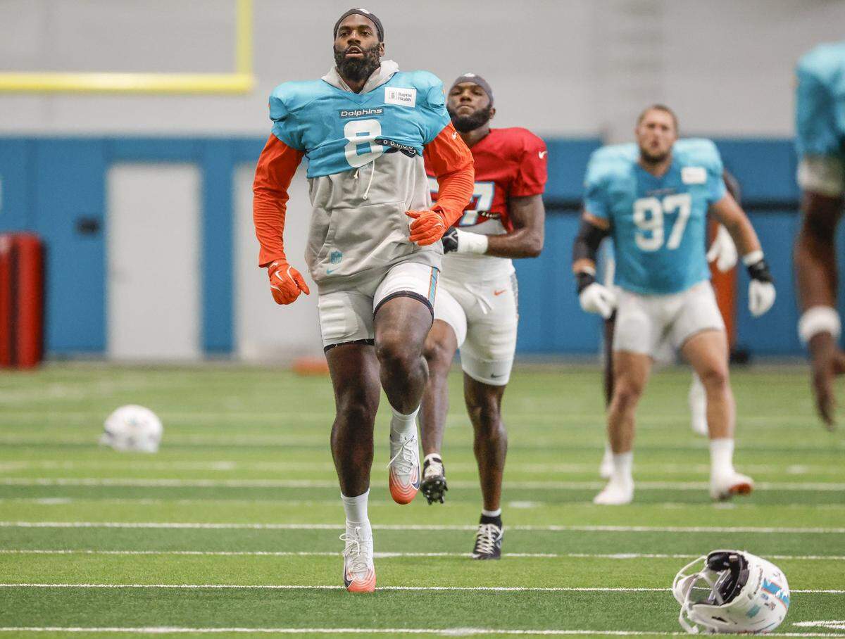 Miami Dolphins linebacker Matthew Judon (8) works out with teammates during practice at the Miami Dolphins Training Camp in Miami Gardens, Florida, on Wednesday, August 20, 2025.