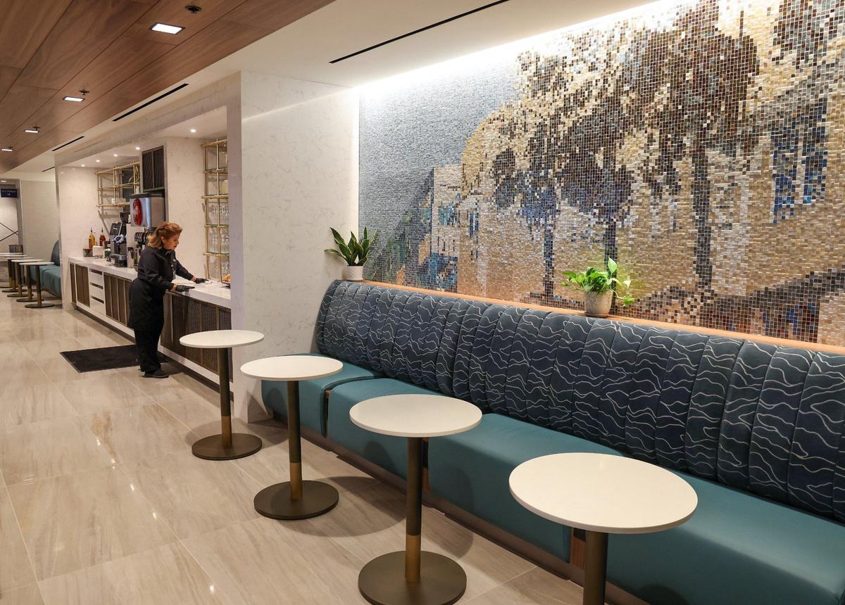 Tables and booths at the Sky Club lounge at MIA.