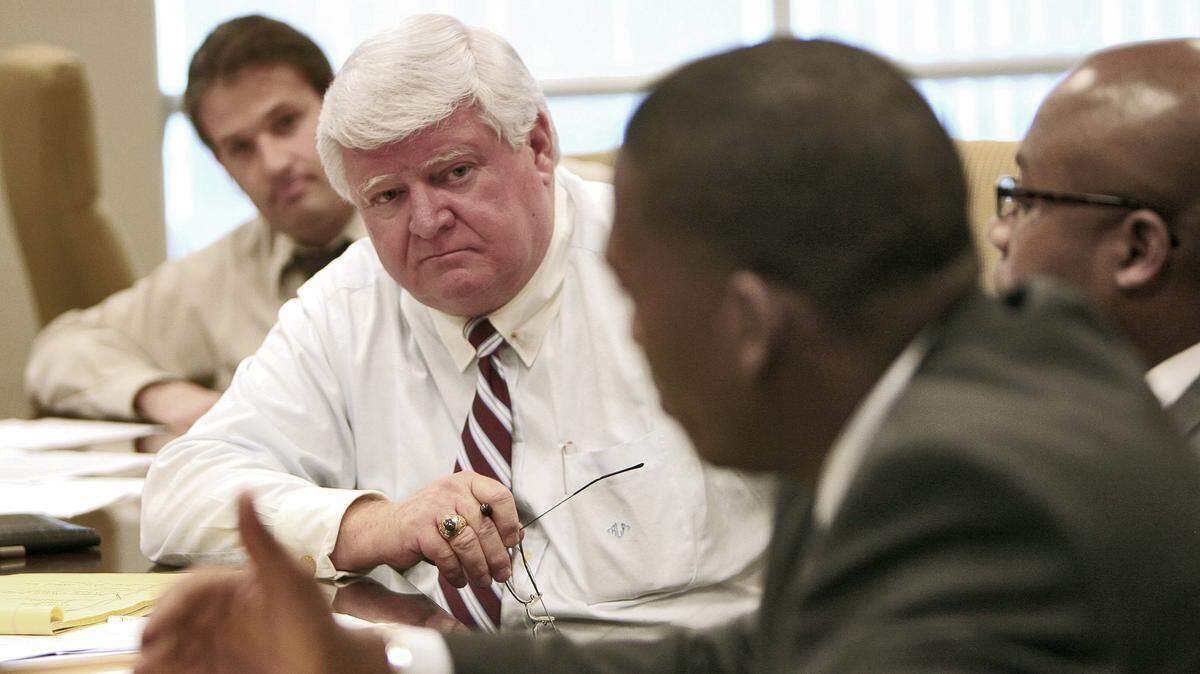March 14, 2007: Chief Justice R. Fred Lewis of the Florida Supreme Court, center, listens to Robert Vaughan, right, Caribbean Bar Association, during an informal meeting with minority bar heads in Miami Wednesday to address diversity and fairness training for Florida judges. Bill Gelin, Justice Advocacy Association of Broward, listens at left. 