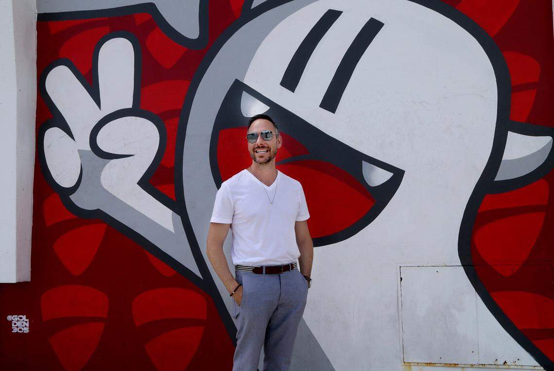 Tony Cho, founder and CEO of Metro 1, stands in front of a building located at Northwest 29th Street and Second Avenue in Wynwood on Friday, July 20, 2018. Cho is looking for a joint venture partner for an ambitious project that would add hotel rooms, condos and rental apartments to Wynwood.