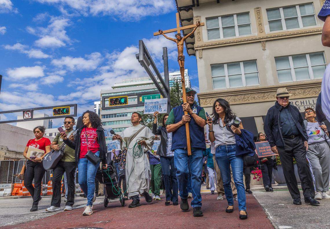 A group of immigrants advocates marched in a procession from the Gesu Catholic Church in downtown Miami to the EOIR Immigration Court, as part of the nationwide “One Church, One Family: Catholic Public Witness for Immigrants” campaign, on Thursday, November 13, 2025.