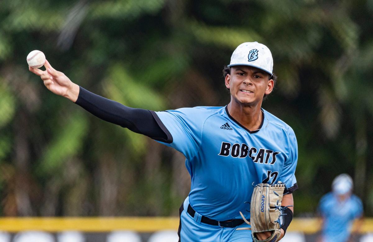West Broward Bobcats pitcher Jean Paul Querales (12) pitches against the Marjory Stoneman Douglas Eagles in the second inning of their Region 4-7A baseball final at Anthony Rizzo Field on Monday, May 13, 2024, in Parkland, Fla.