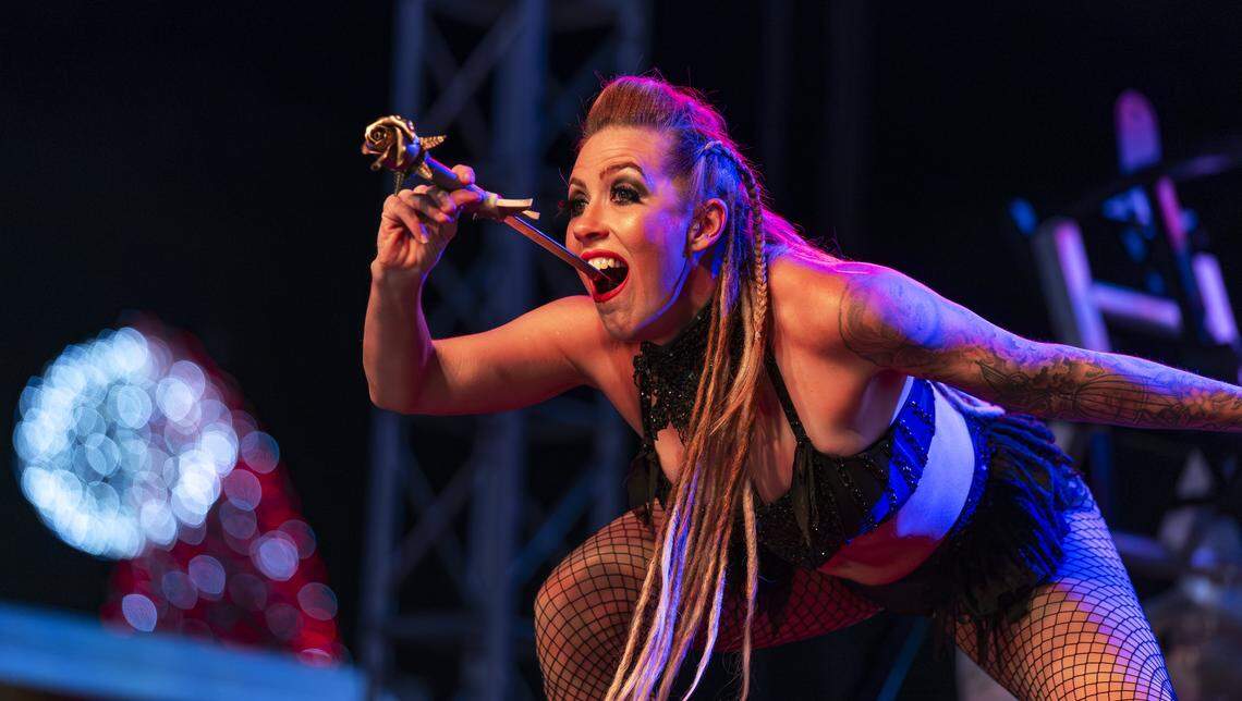 Willow Lauren performs for guests during the grand opening of Ripley's Believe It or Not! Christmas Park at Amelia Earhart Park on Thursday, Nov. 13, 2025, in Hialeah, Fla.