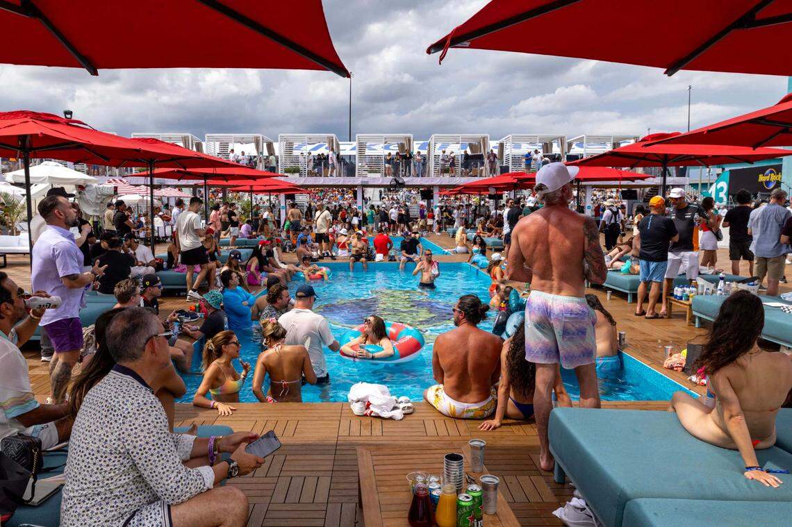 Ticket holders react from the pool as Sofi Tukker performs in The Beach Club inside Miami International Autodrome ahead of the Formula One Miami Grand Prix at the Miami International Autodrome on Sunday, May 4, 2025, in Miami Gardens, Fla.