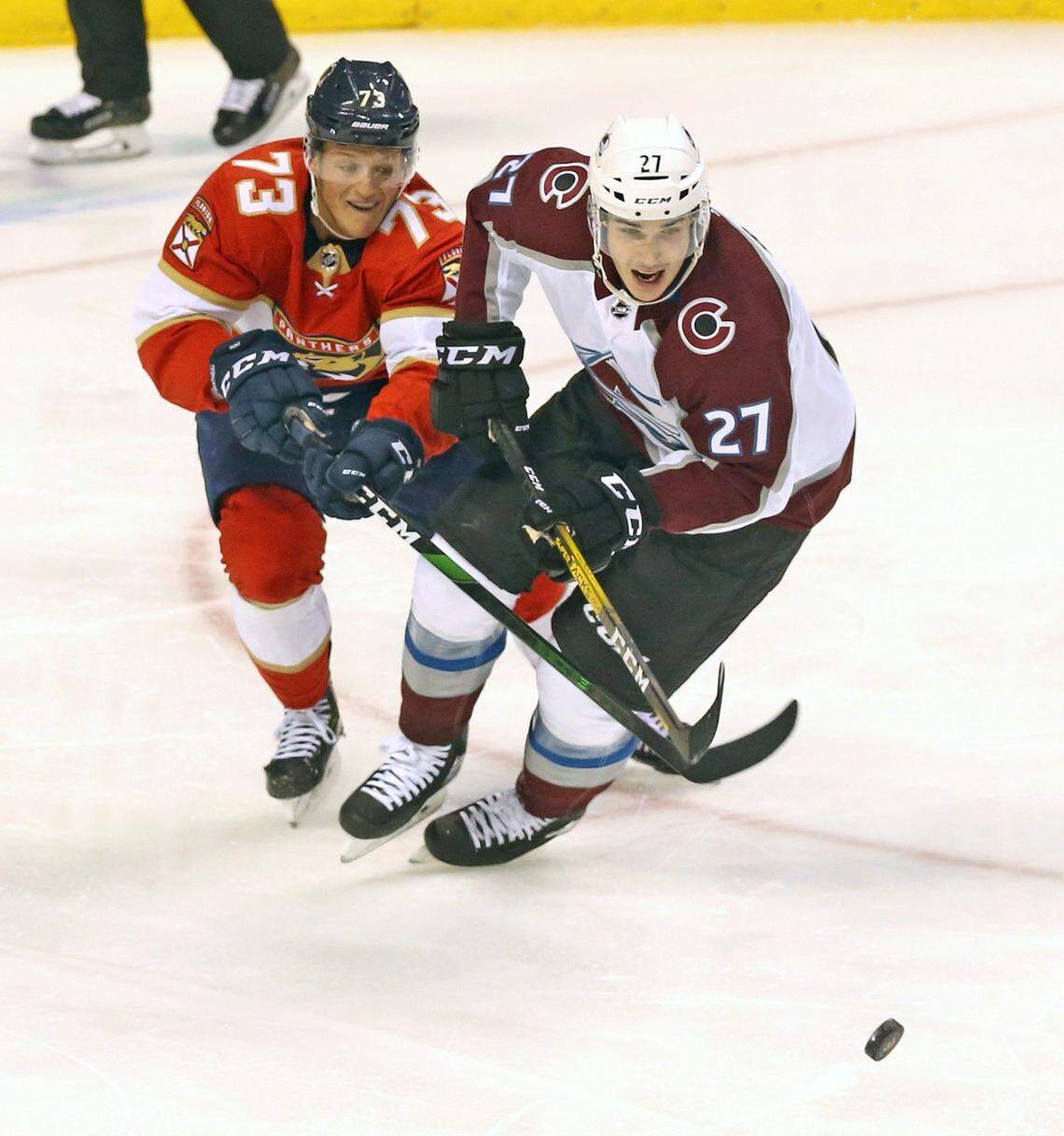 Florida Panthers Dryden Hunt (73) and Colorado Avalanche Ryan Graves (27) in the third period at the BB&T Center in Sunrise, Florida, Friday, October, 18, 2019.