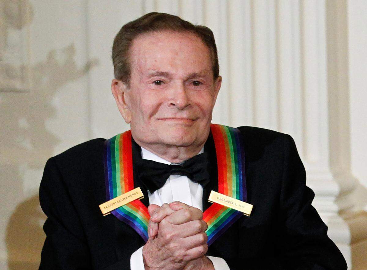 In this Dec. 5, 2010, file photo, composer Jerry Herman, one of the recipients of the 2010 Kennedy Center Honors, is introduced during a reception in the East Room of the White House in Washington.