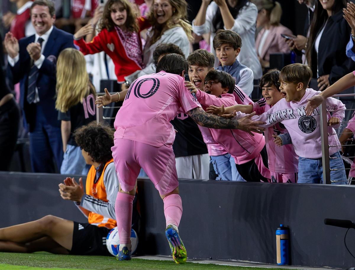 Inter Miami forward Lionel Messi (10) celebrates with family and friends after scoring a penalty kick against Los Angeles FC during the second half of the Concacaf Champions Cup quarterfinal second leg at Chase Stadium in Fort Lauderdale, Florida, on Wednesday, April 9, 2025.