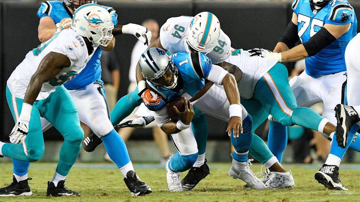 Dolphins defensive end Robert Quinn sacked Panthers quarterback Cam Newton twice in Friday’s preseason game.
