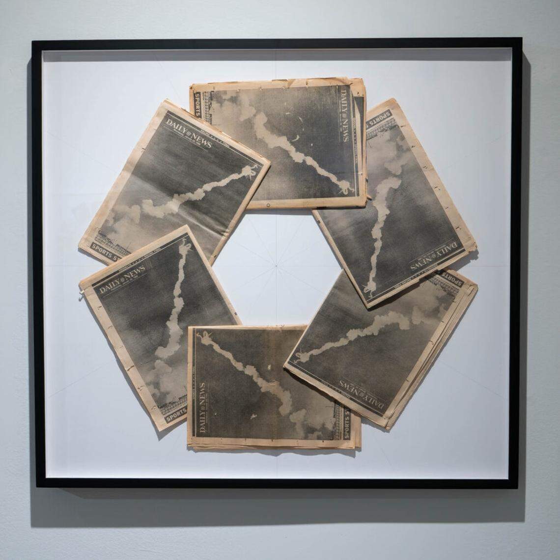 Six identical Daily News newspapers, displaying the contrails of the exploded Challenge spacecraft, where seven astronauts were lost. This was included in Dennis Scholl’s first U.S. solo exhibition, too, in Miami.