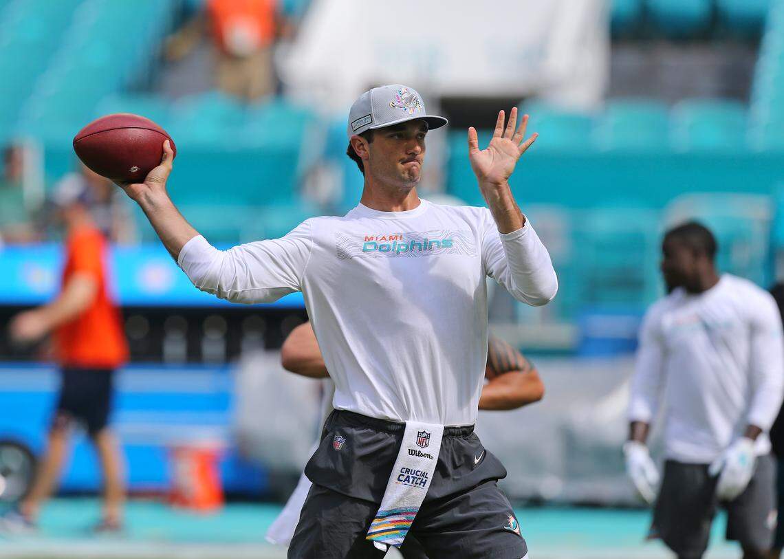 Miami Dolphins quarterback Brock Osweiler throws before the start of an NFL football game against the Chicago Bears at Hard Rock Stadium on Sunday, October 14 2018, in Miami Gardens.