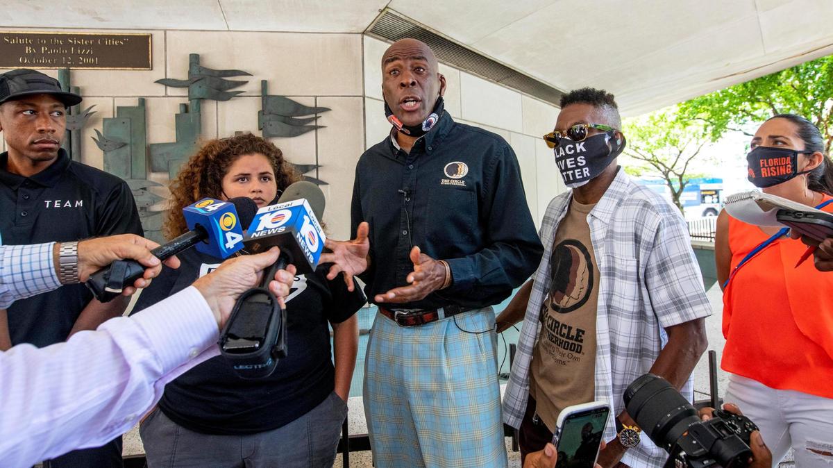 Executive Director for the Circle of Brotherhood, Brother Lyle Muhammad, speaks to the media along with other grassroots organizations like the Dream Defenders, Roots Collective and Florida Rising as they banded together to form a coalition committed to healing and justice for all South Florida communities and pressure Miami-Dade officials to fund their initiatives already in place and aimed at reducing gun violence, outside the Stephen P. Clark Government Center in Downtown Miami, Florida, on Friday, June 4, 2021. The newly formed coalition demands that $30 million or 6% of the $500 million owed to Miami-Dade as apart of President Biden’s American Rescue Plan, be devoted to their programs.