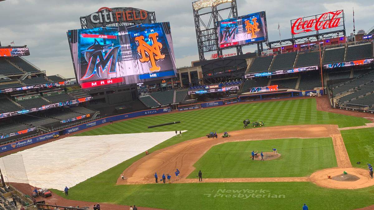 The Citi Field groundscrew works on the infield dirt prior to the Miami Marlins’ game against the New York Mets on Tuesday, Sept. 26, 2023.