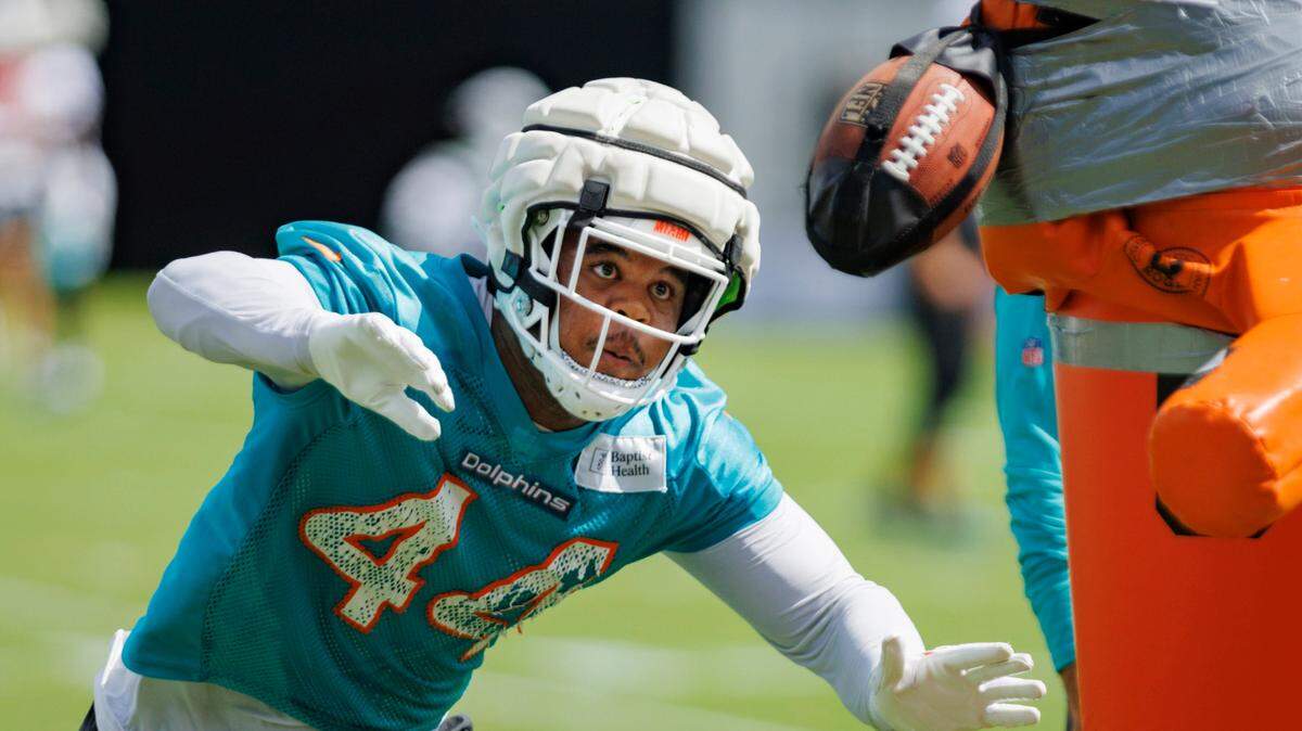 Miami Dolphin’s Chop Robinson (44) runs a drill during training camp on Monday, Aug. 12, 2024, at Baptist Training Center at Hard Rock Stadium in Miami Gardens, Fla.