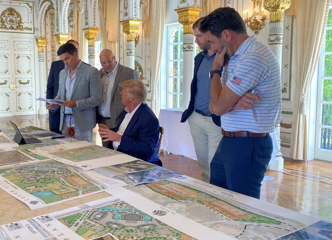 Lawyer and lobbyist Felix Lasarte stands to the right of former President Donald Trump on Sept. 27, 2021, at Mar-a-Lago in Palm Beach during a meeting on the planned expansion of his Doral golf resort. To Lasarte’s right is Andrew Starr, a partner in Doral’s PPKS Architecture firm and to his left is PPKS partner Peter Kiliddjian. Standing to Trump’s left are the Trump Organization’s Eric Trump and Mike Vergara.