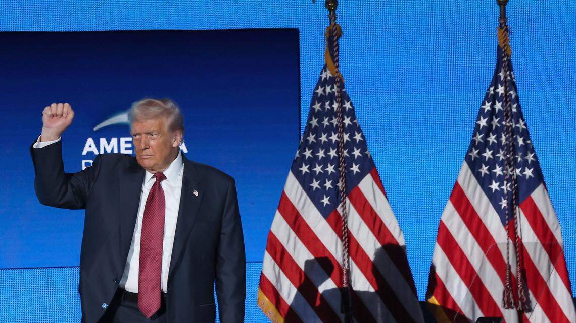 President Donald J. Trump pumps his fist while exiting the stage during the American Business Forum at the Kaseya Center in Miami, Florida on Wednesday, November 5, 2025.